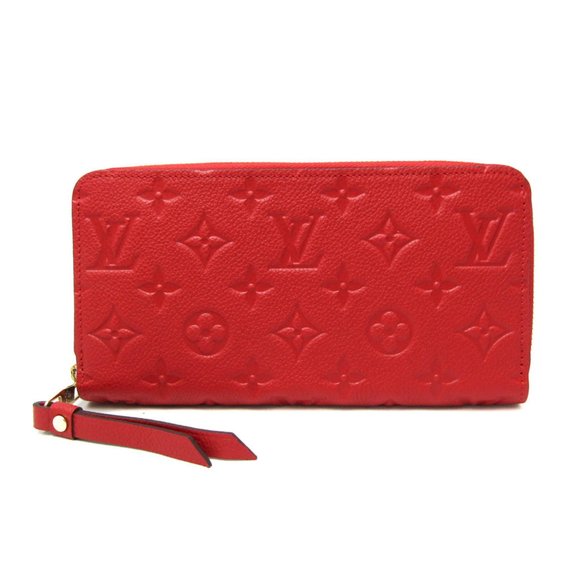 LOUIS VUITTON Brown Monogram Wallet - Picture 1 of 12